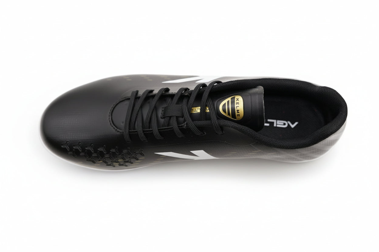BOTAS DE FÚTBOL AGILITY LITE NEGRO-ORO