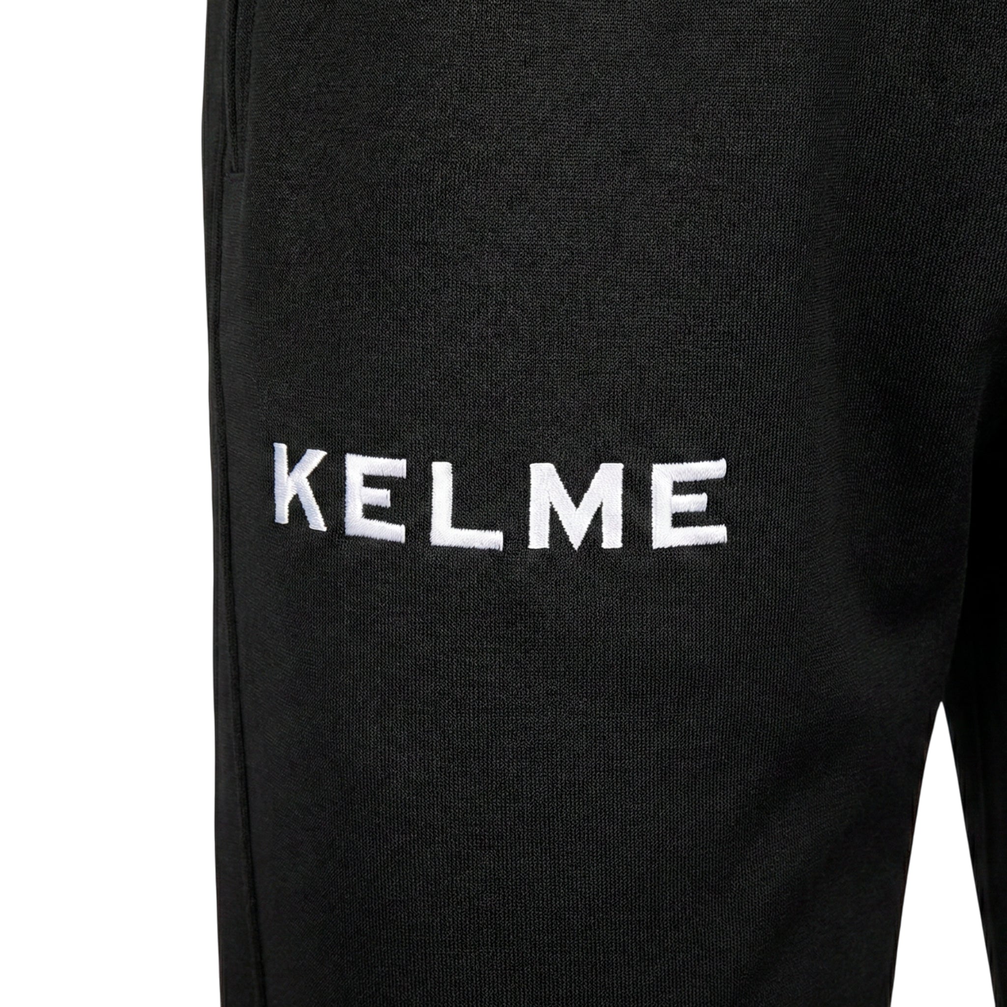 PANTALÓN LARGO DE CHÁNDAL GLOBAL NEGRO Y BLANCO